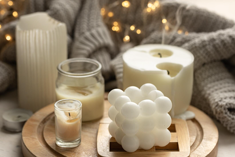 świeczka w szklanym pojemniku